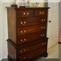 F32. 7-Drawer mahogany tallboy chest. 52”h x 38”w x 19”d 